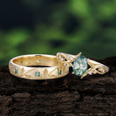 Nature-Inspired Branch-Wrapped 4-Prong Oval Moss Agate Engagement Couple Rings